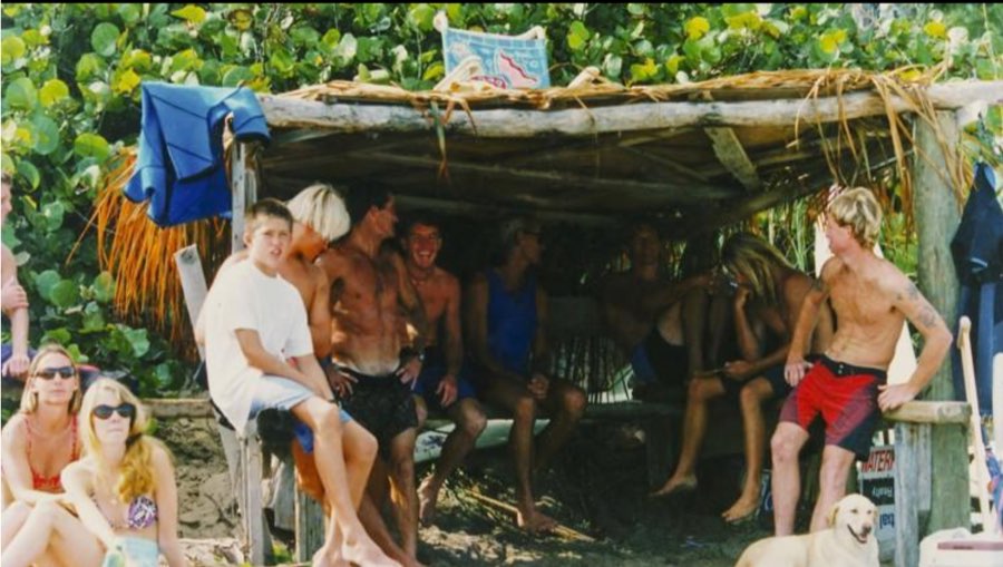 Palm Beach County surfers gathered at a beach shack, from the museum's archive